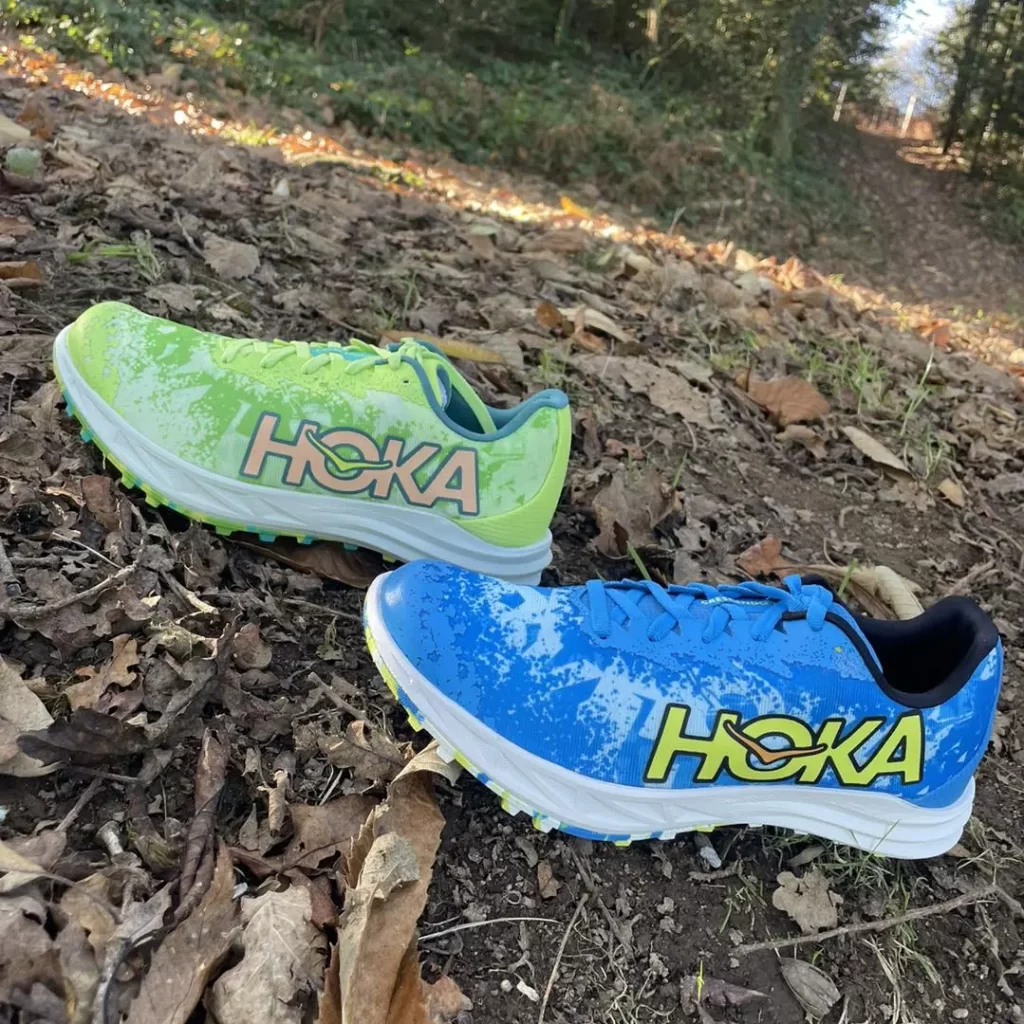 Hoka Unisex Crescendo XC spikes on a cross-country course